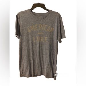 American Eagle distressed T-shirt, Blue with  grey wording, size medium